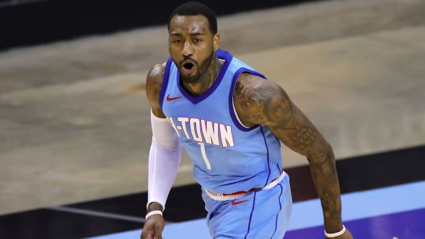 Houston Rockets guard John Wall reacts